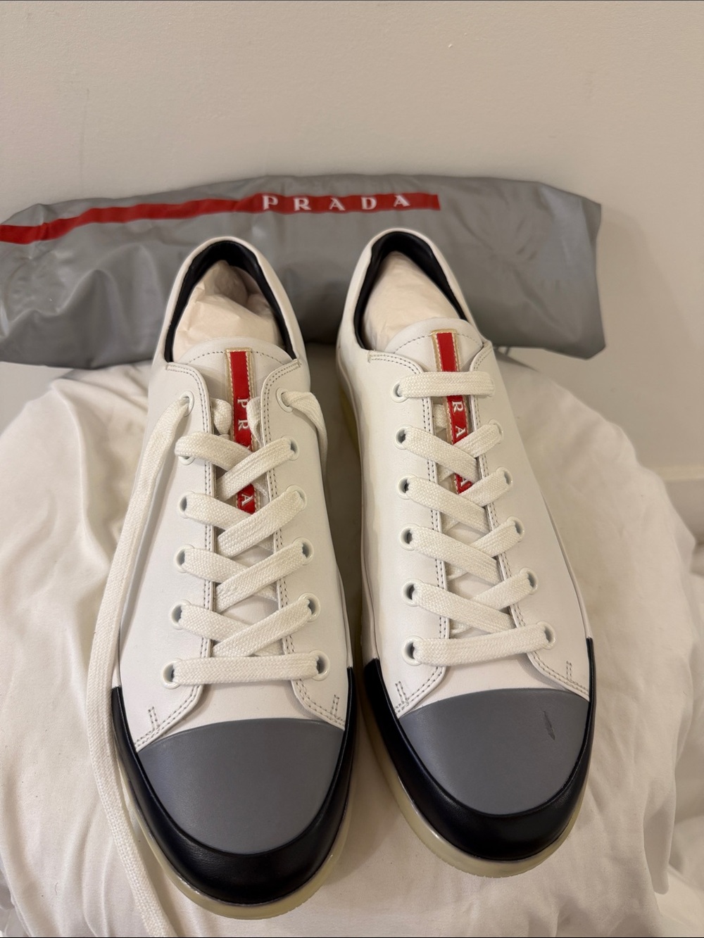 Prada White Leather Sneakers with Red Logo Stripe and Gray/Black Toe